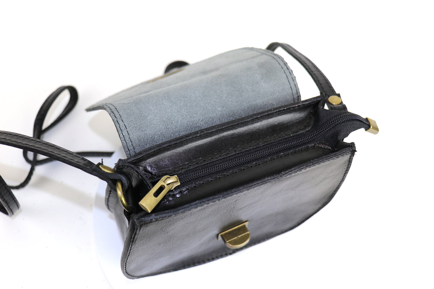 Open view of the black Cora Vintage Small Leather Crossbody Bag.