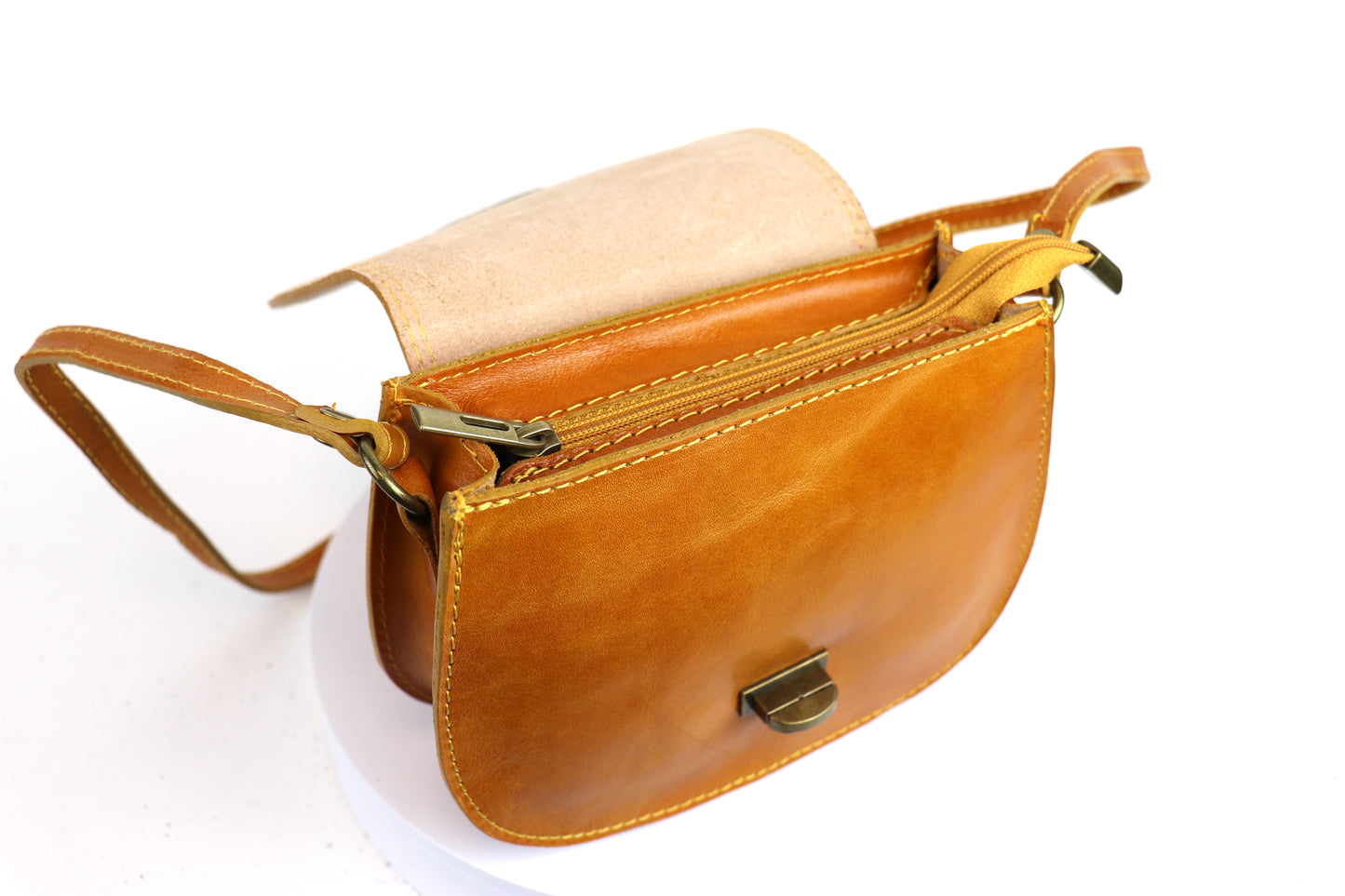 Open view of the mustard yellow Cora Vintage Small Leather Crossbody Bag