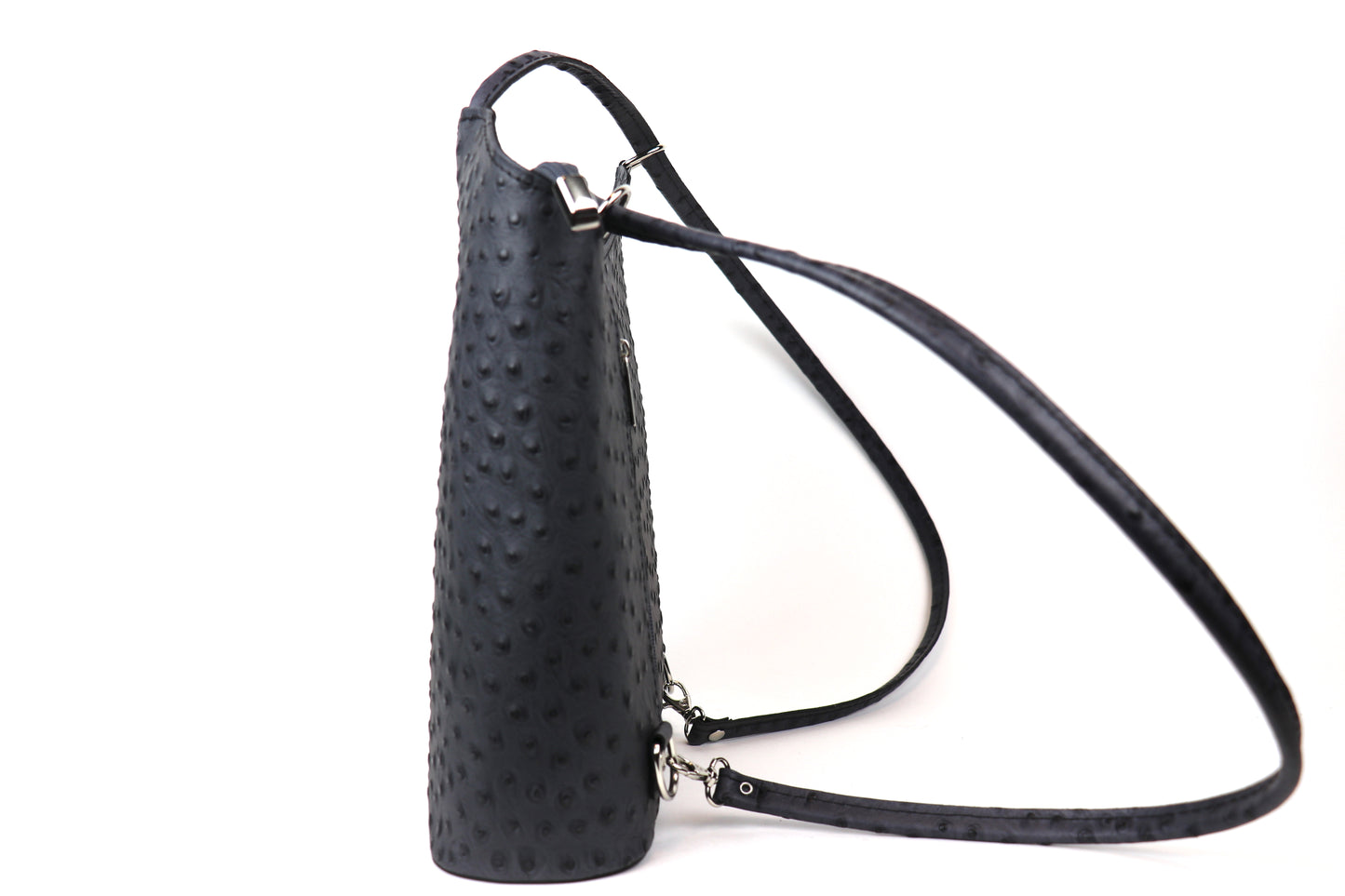 Side view of a Black Single-Tone Ostrich Style Italian Leather Convertible Handbag and Backpack, showcasing the textured leather design and detachable straps.