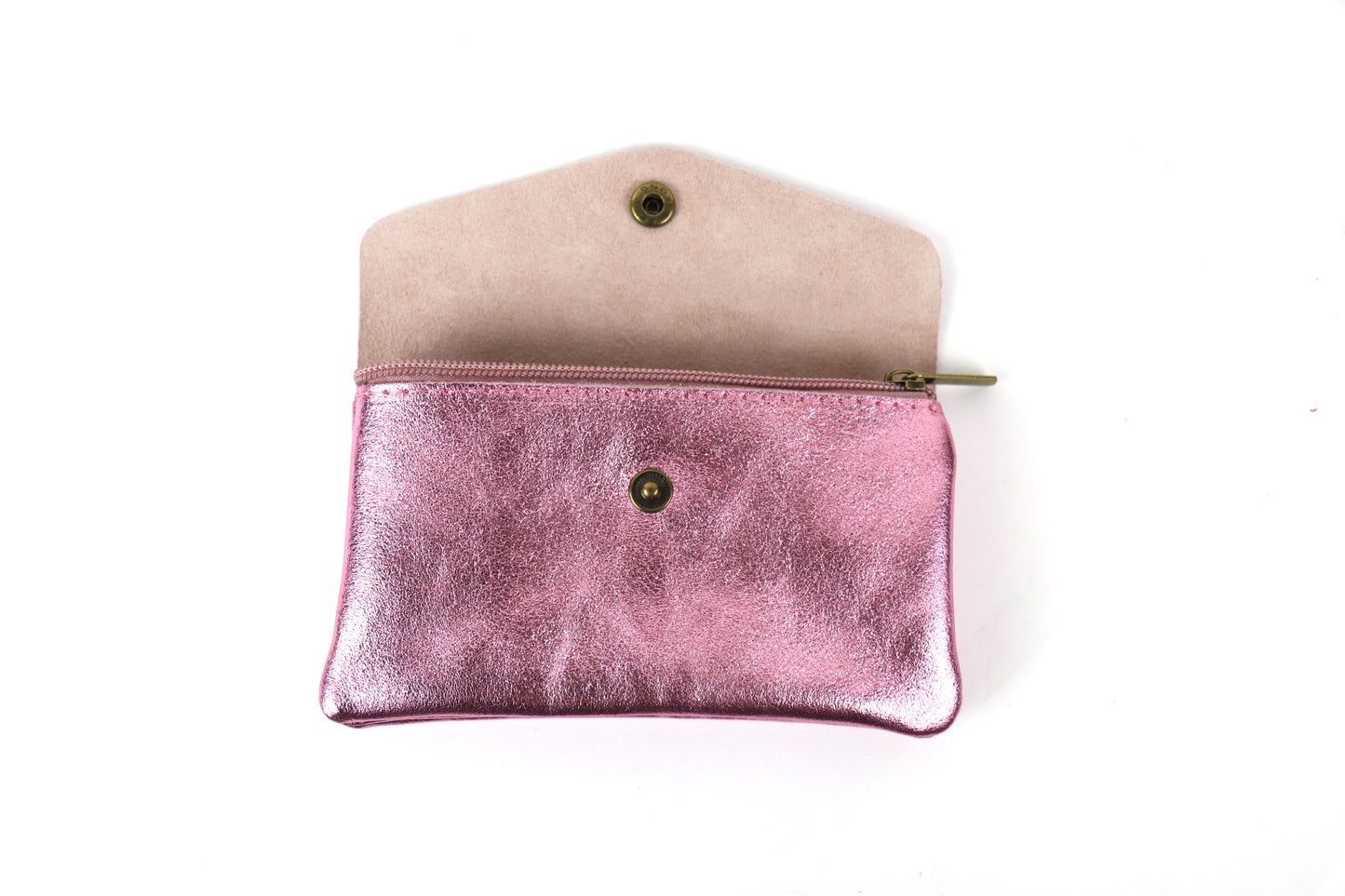 Opened view of a light pink metallic pouch, displaying its interior and button clasp.