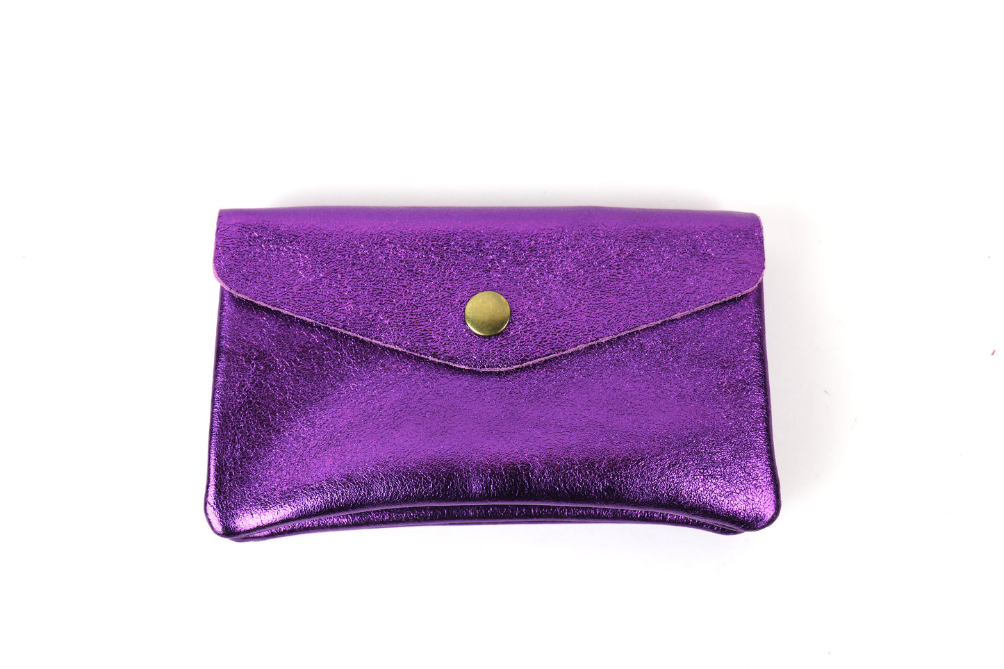 Front view of a purple metallic pouch, featuring a shiny textured surface and a central button clasp.