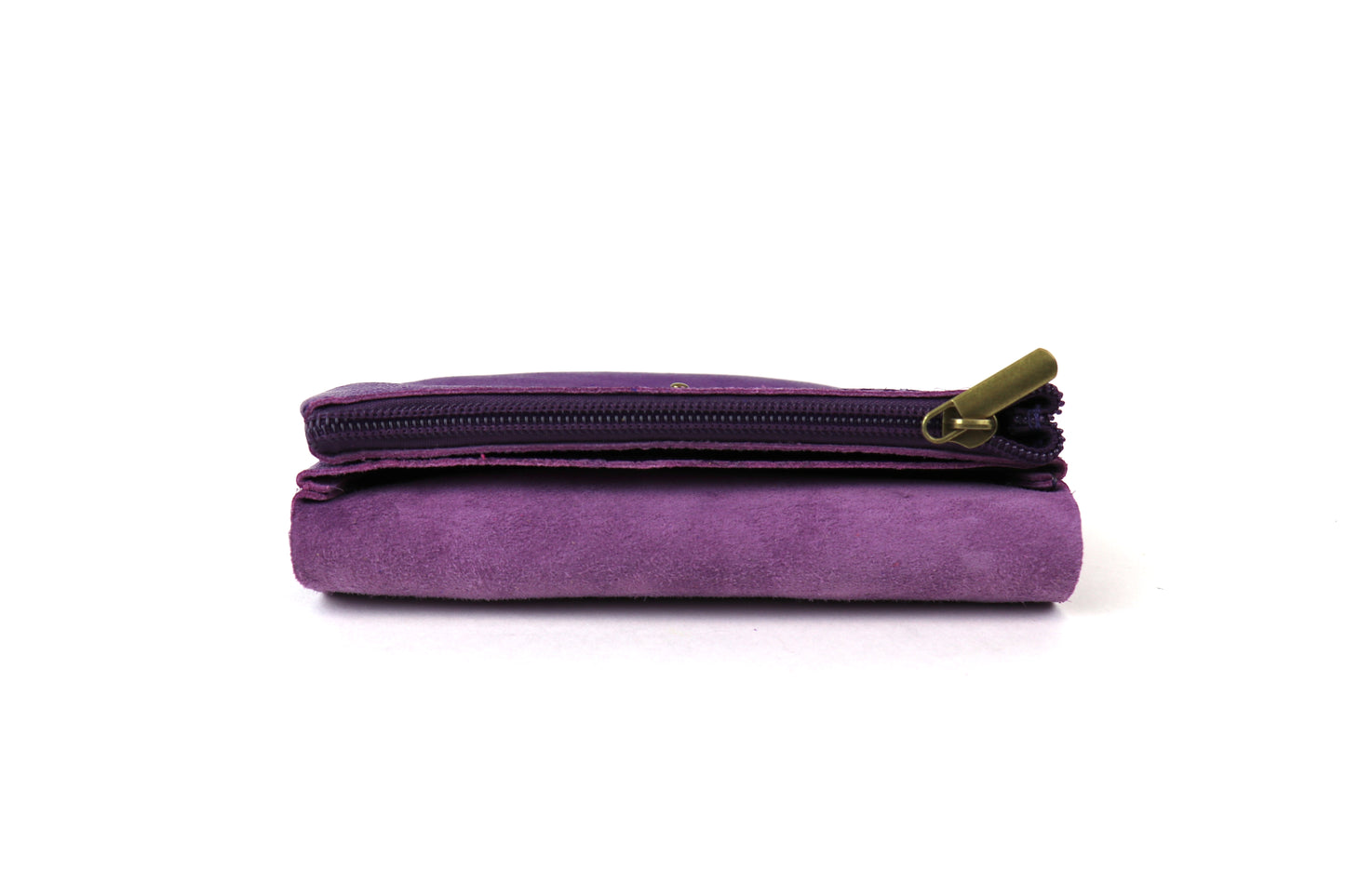 Side view of a purple metallic pouch, displaying its contents and the zipper compartment.