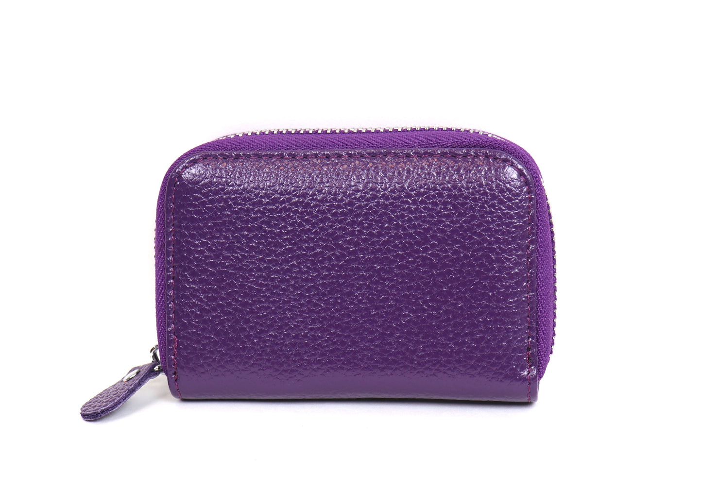 Back view of a small leather card holder wallet in purple, showing the smooth leather surface.