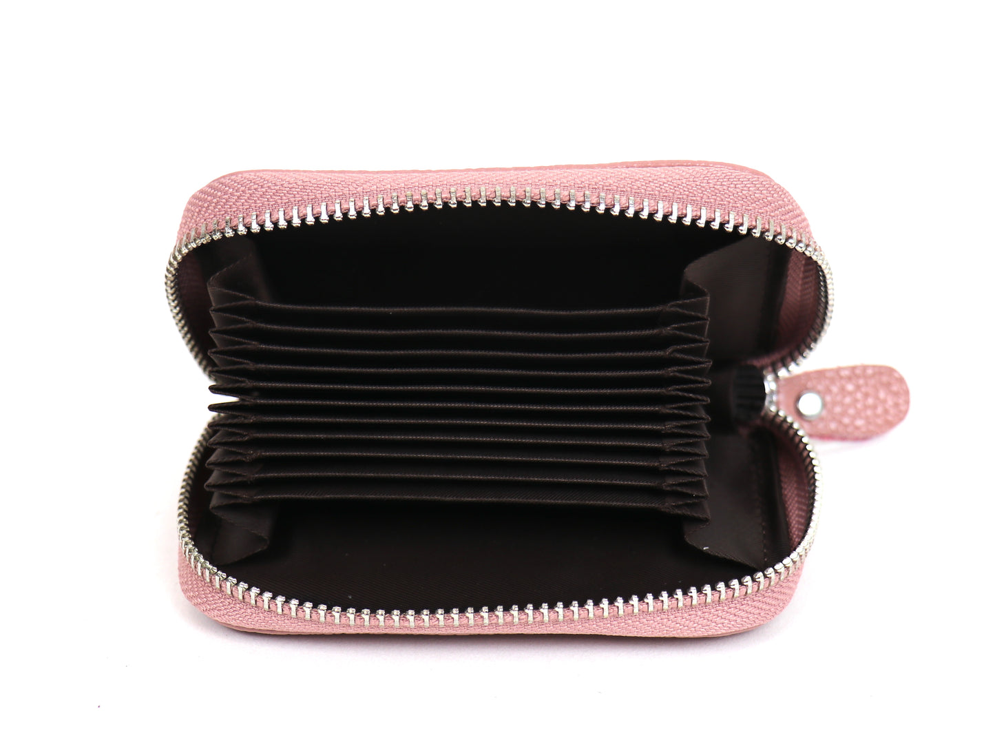 Opened dusty pink leather card holder wallet, revealing the interior card slots.