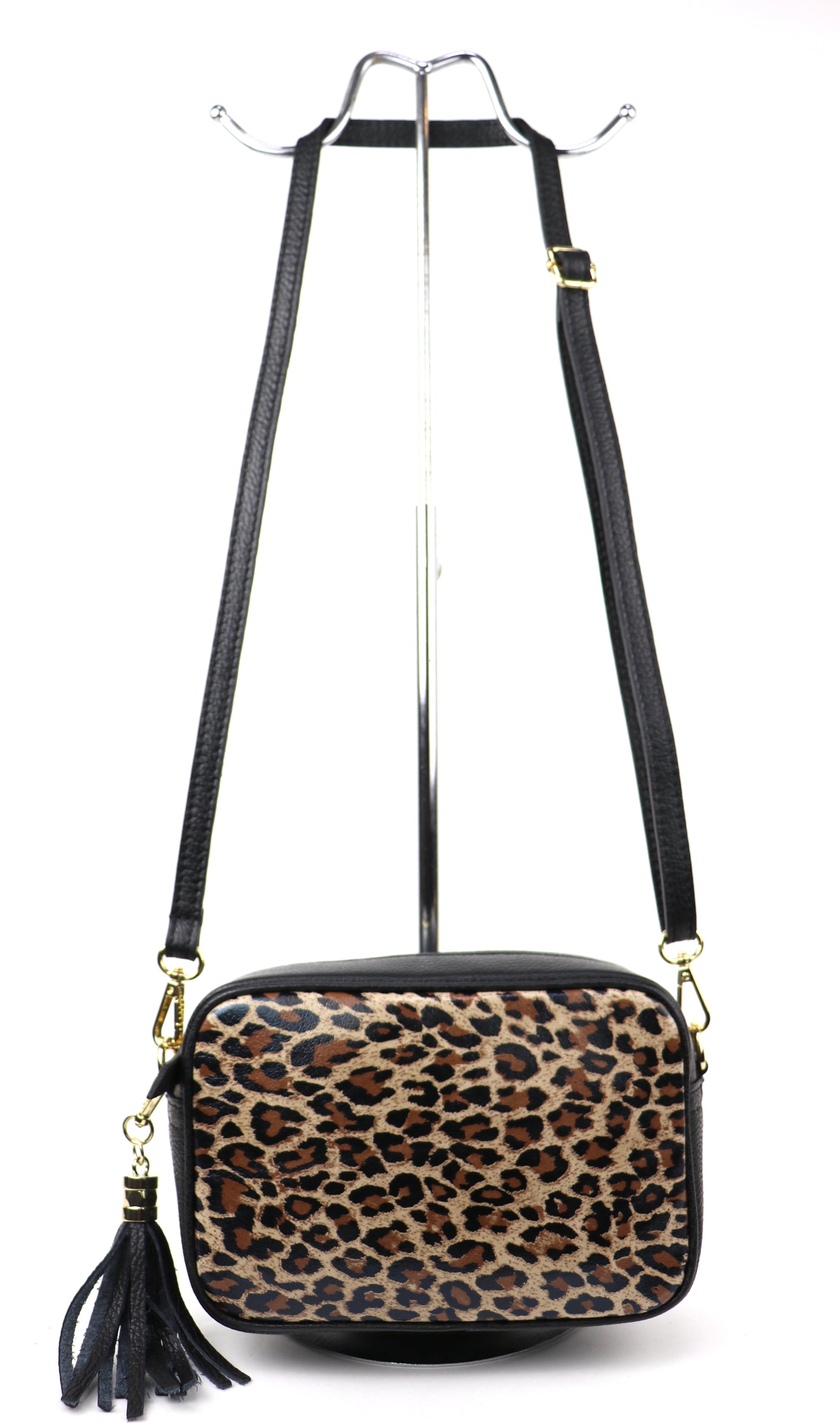 Leather Leopard print bag with detachable black strap and gold hardware, displayed front-facing.