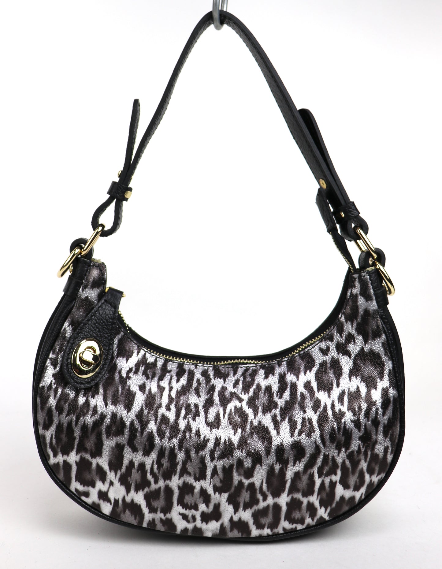 Silver half moon shoulder/crossbody bag, front view.