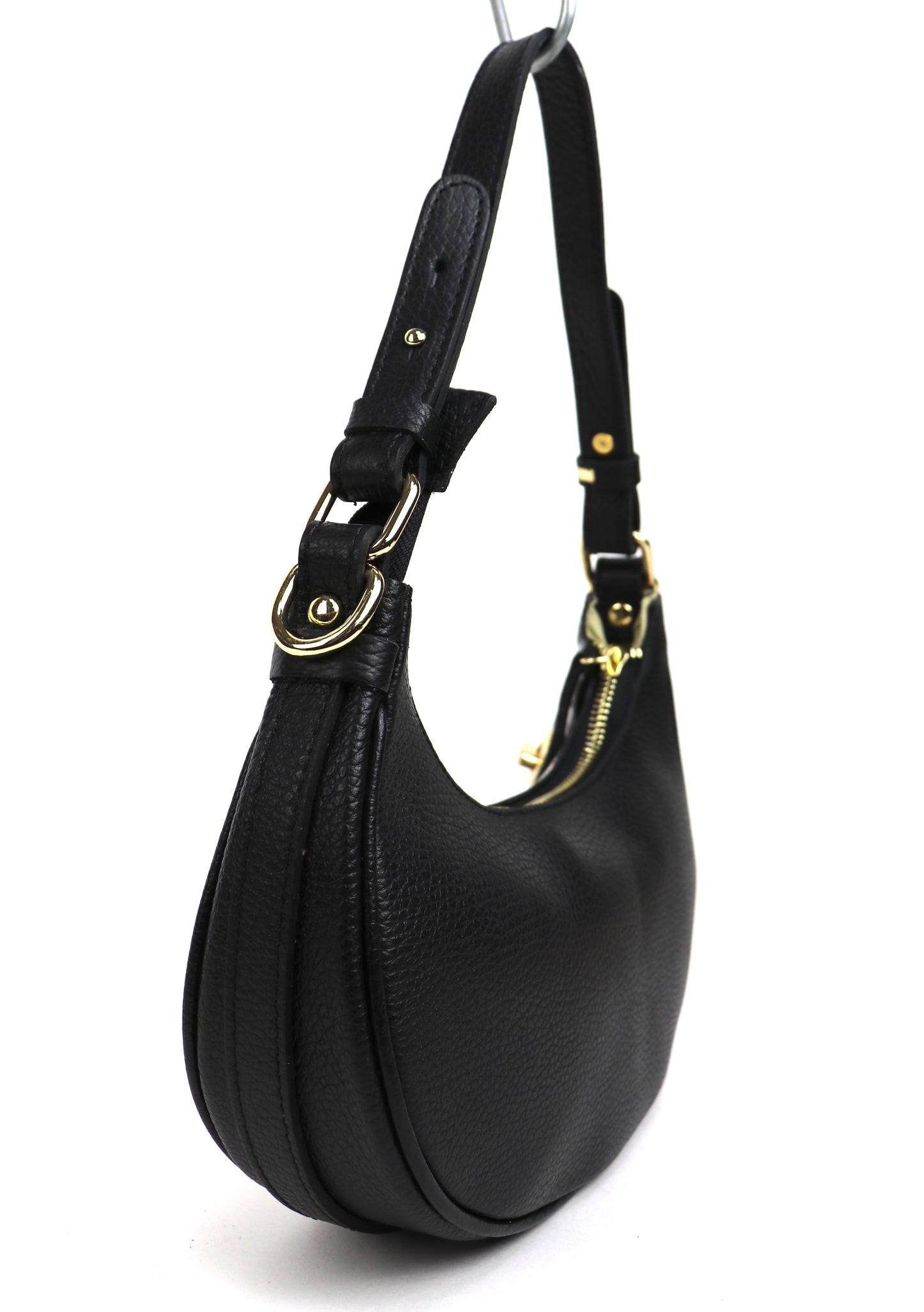 Black small half moon shoulder/crossbody bag, angled side view, with pebbled leather texture, gold-tone hardware, and adjustable strap displayed against a white background.