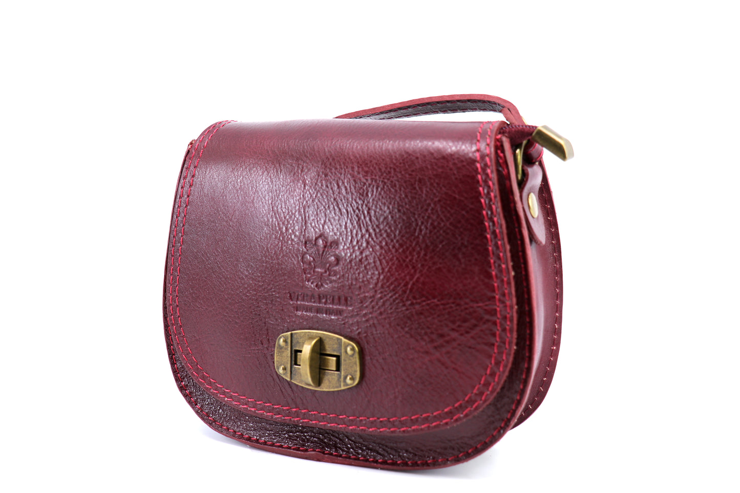 Side view of a dark red Cora Vintage Small Leather Crossbody Bag, showcasing the bag’s detailed brass lock clasp, displayed on a white background.