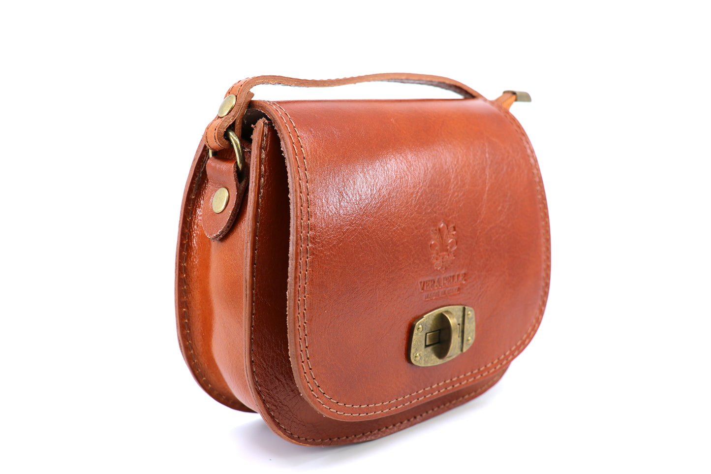 Side view of the light tan Cora Vintage Small Leather Crossbody Bag featuring a rounded shape and adjustable leather strap on a white background.