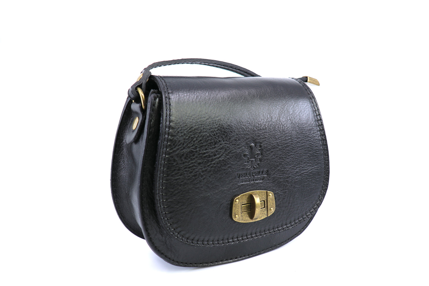 Side view of the black Cora Vintage Small Leather Crossbody Bag, showcasing the leather texture and brass details on a white background.