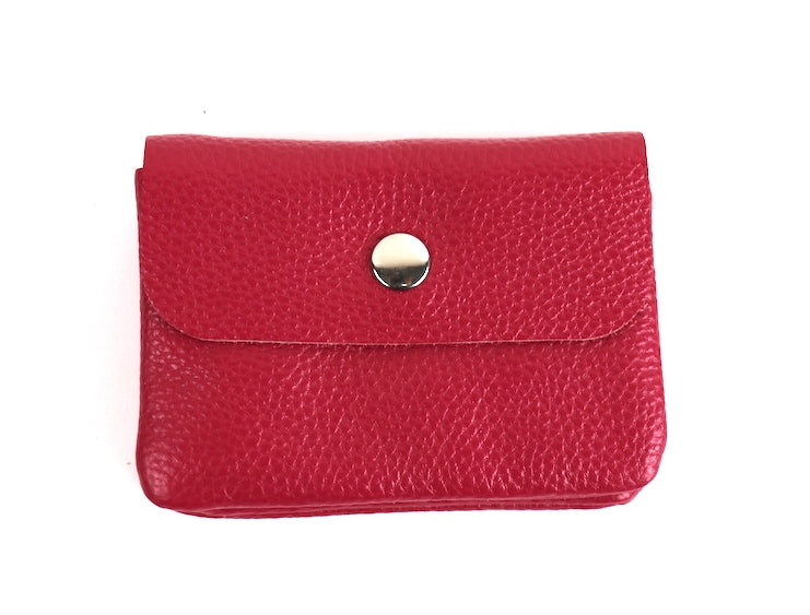 Fuchsia leather wallet with a silver snap button.