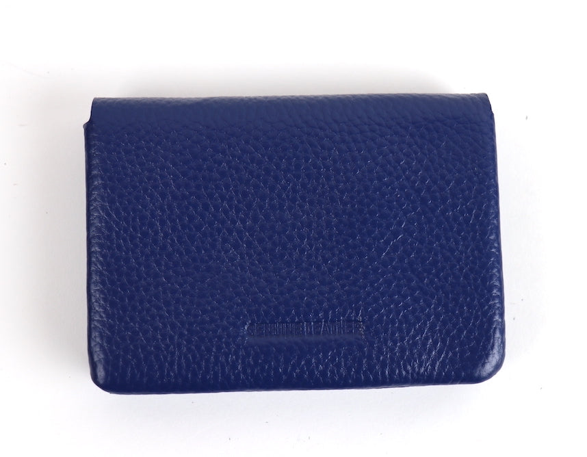 Royal Blue Wallet: A small royal blue leather wallet with a silver snap button.