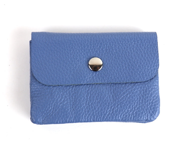 Denim Blue Wallet: A small denim blue leather wallet with a silver snap button.