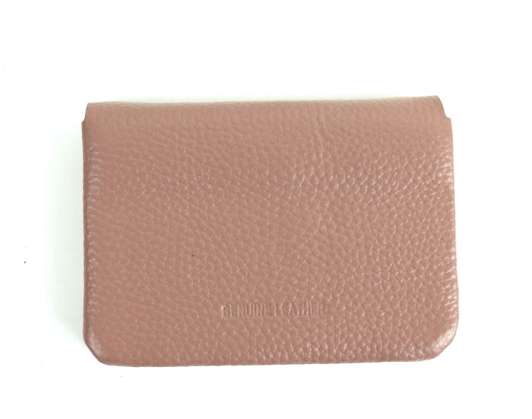 Dusty Pink Wallet: A small dusty pink leather wallet with a silver snap button.