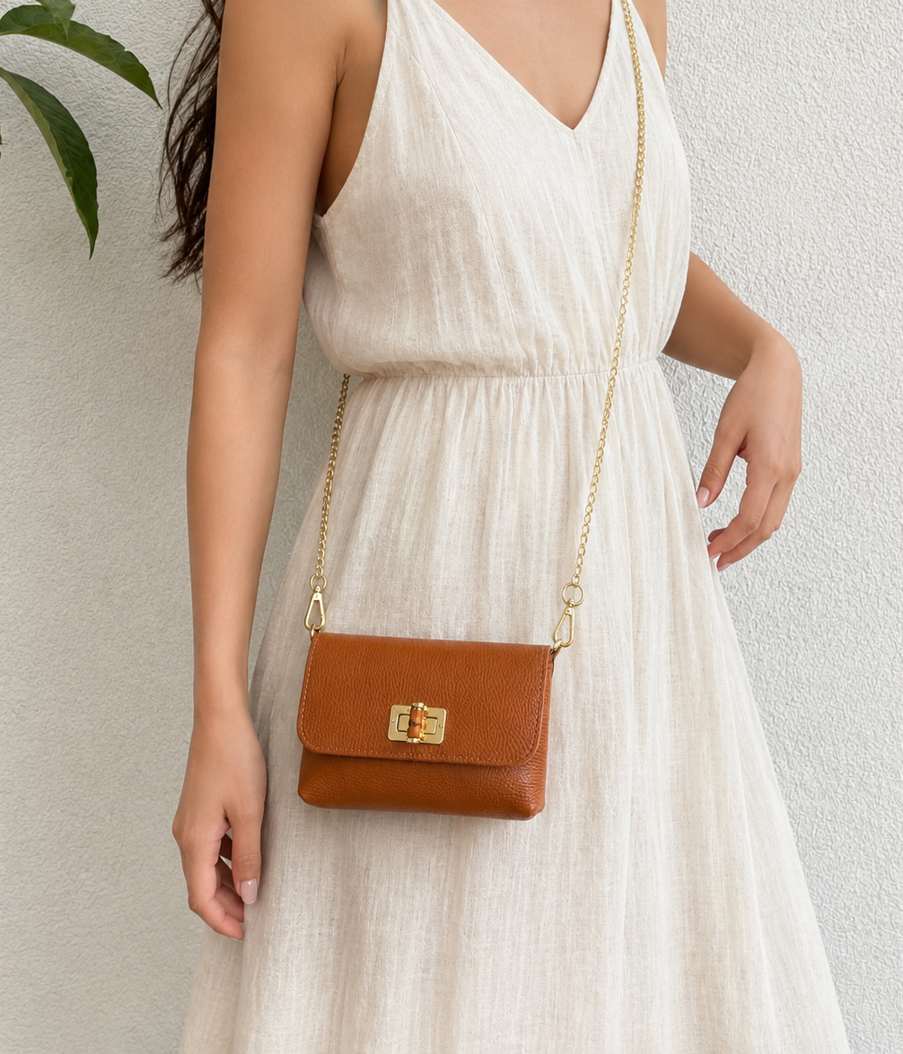 Small Pebbled Leather Clutch/Shoulder/Crossbody Bag with Bamboo-Style Clasp