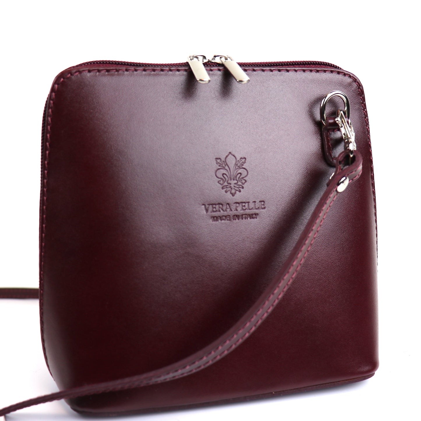 Dark Burgundy Small Handmade Leather Crossbody Bag, front view with an elegant dark tone.
