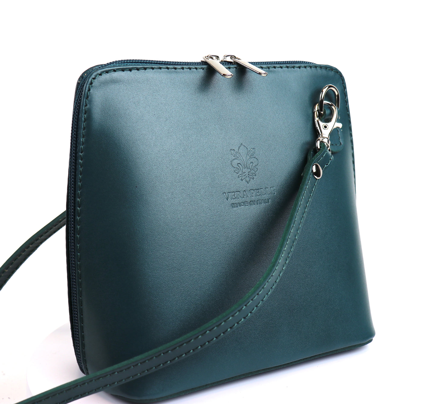 Dark Turquoise Small Handmade Leather Crossbody Bag, front view featuring a unique and sophisticated color.
