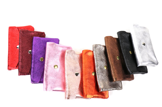 A collection of medium metallic pouches in various colors, including Red, Silver, Navy, Berry, and more.