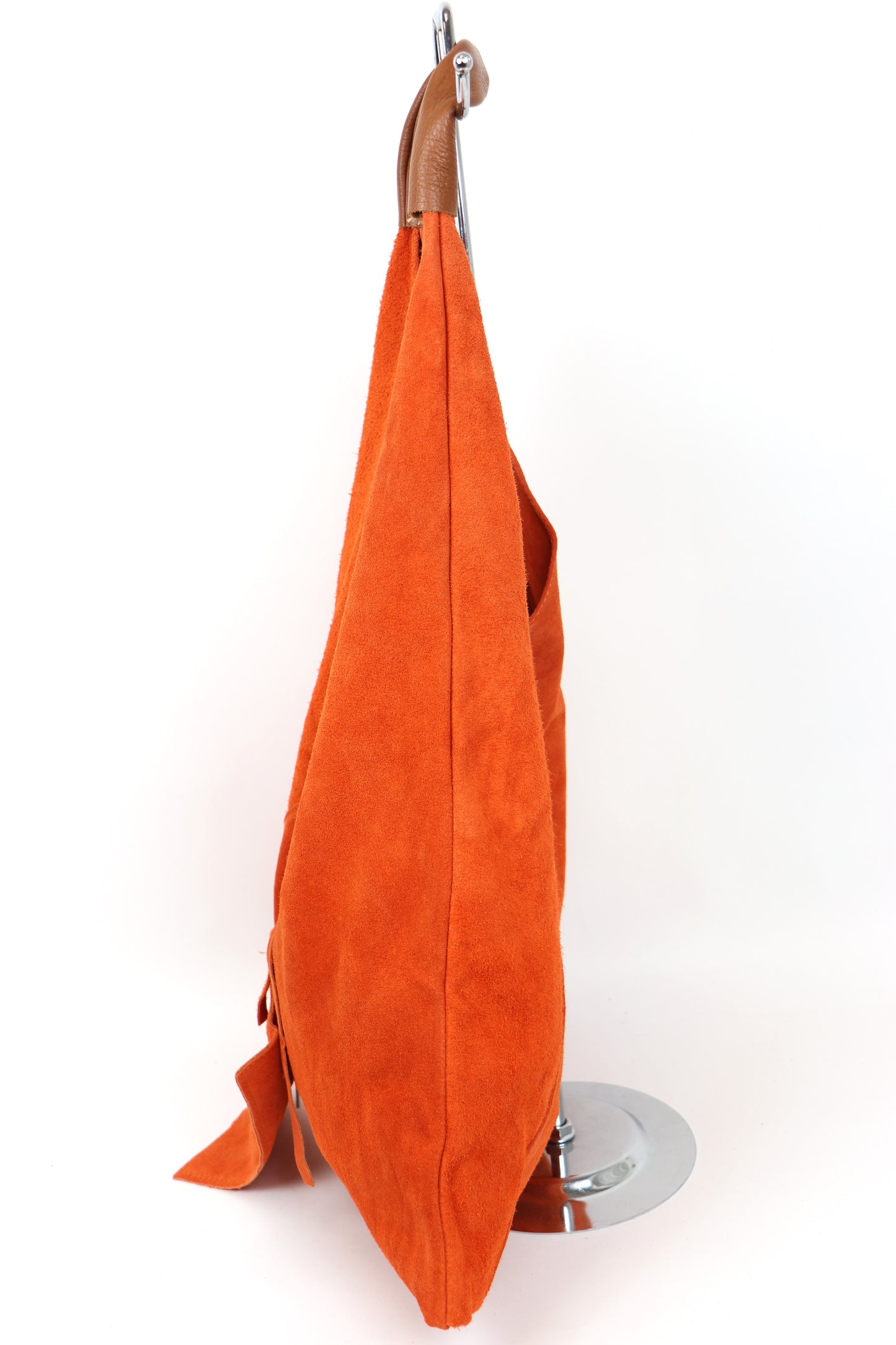 Side view of the Orange Samantha Tote hanging.