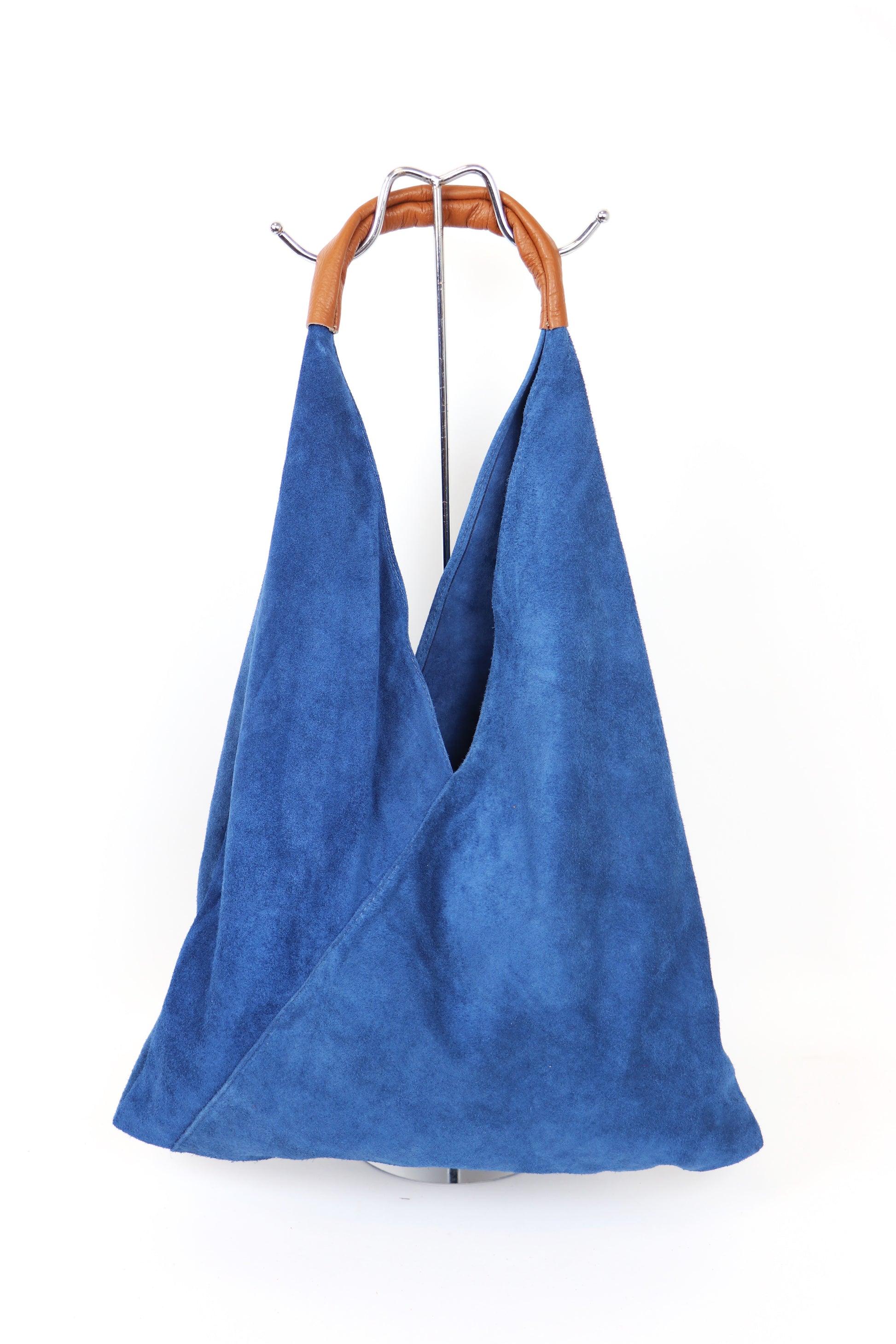 Front view of the Denim Blue Samantha Large Tote Laptop Bag displayed on a stand with brown leather handles.