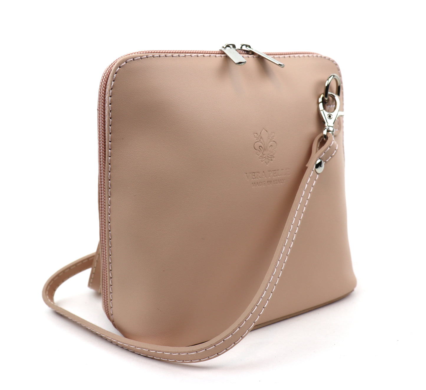 Nude Pink Small Handmade Leather Crossbody Bag, side view highlighting its soft pastel shade.
