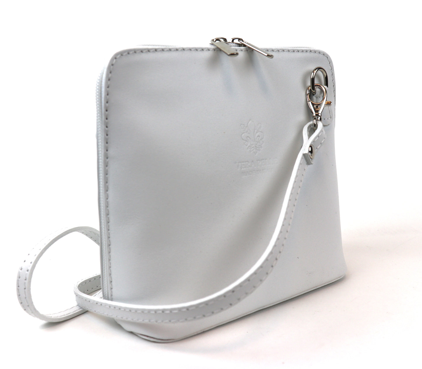 White Small Handmade Leather Crossbody Bag, side view showcasing the clean, minimalist design.
