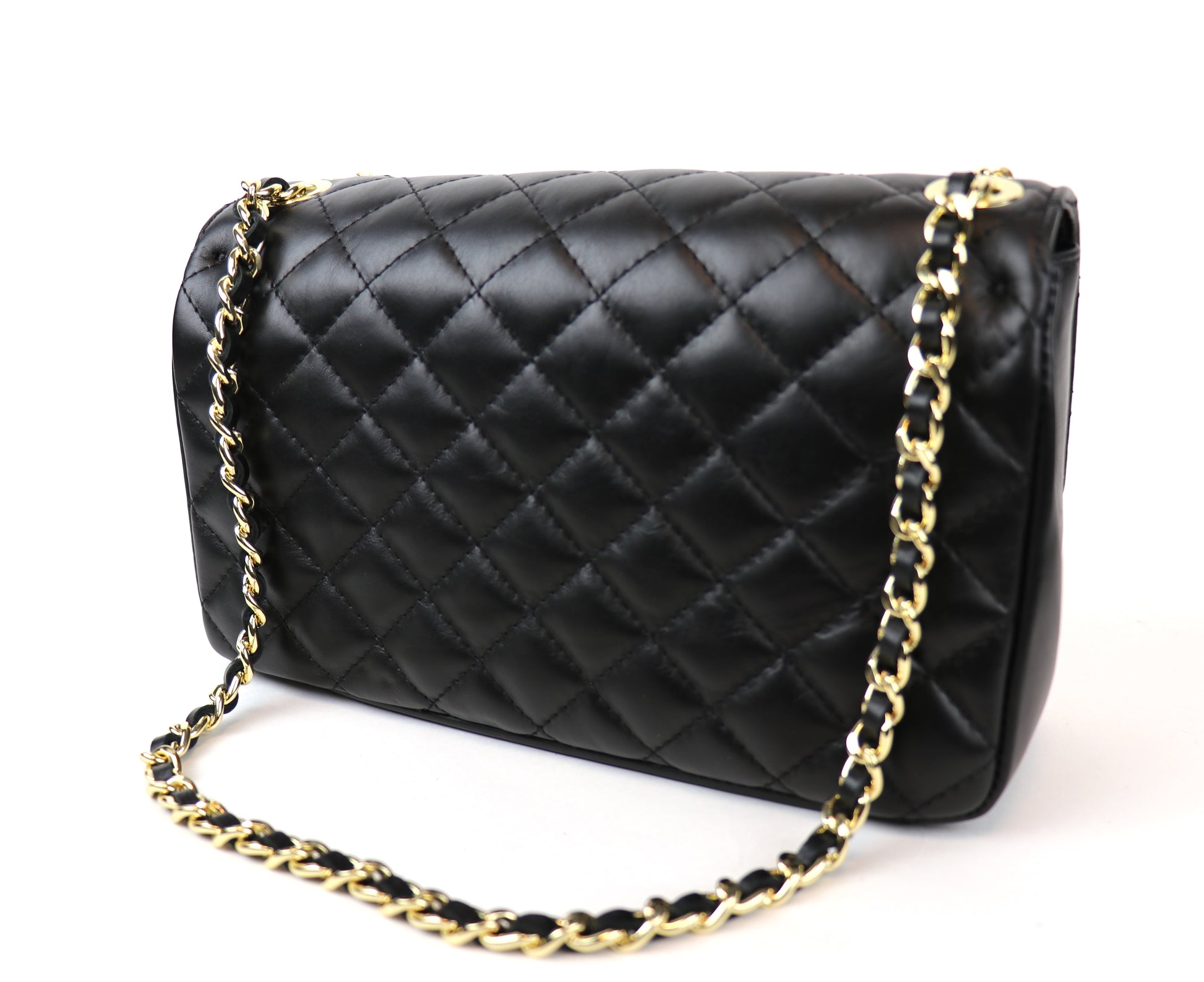 The back view of a black quilted leather bag, showcasing the detailed stitching and smooth texture. The gold chain strap is partially visible, emphasizing the luxurious design.