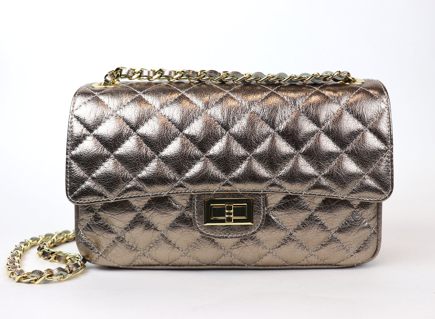 A front view of a bronze quilted leather bag with a gold twist-lock closure and gold chain strap, displayed on a plain background.






