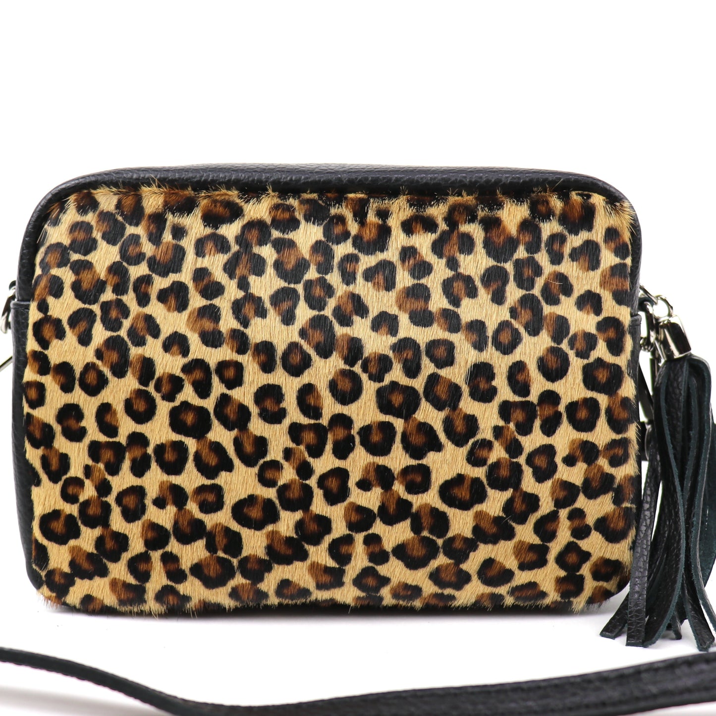 Leopard print leather bag with detachable black strap and tassel, displayed front-facing.