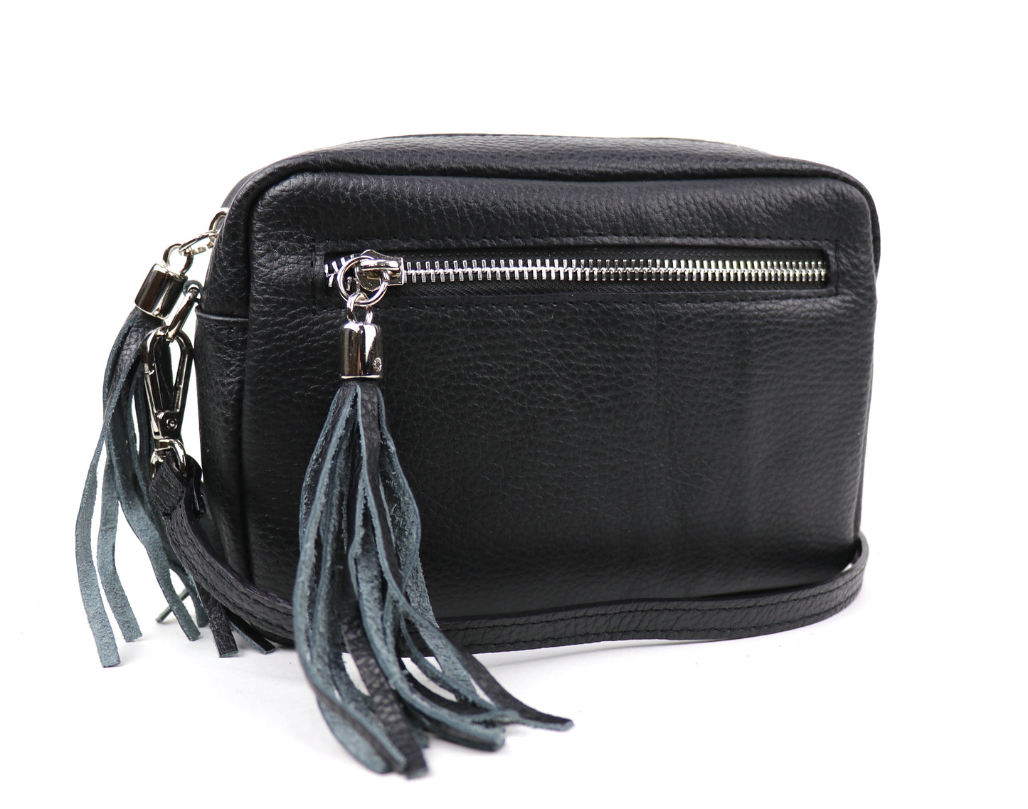 Back view of the Cow print leather bag, featuring a black leather side with a zip pocket.