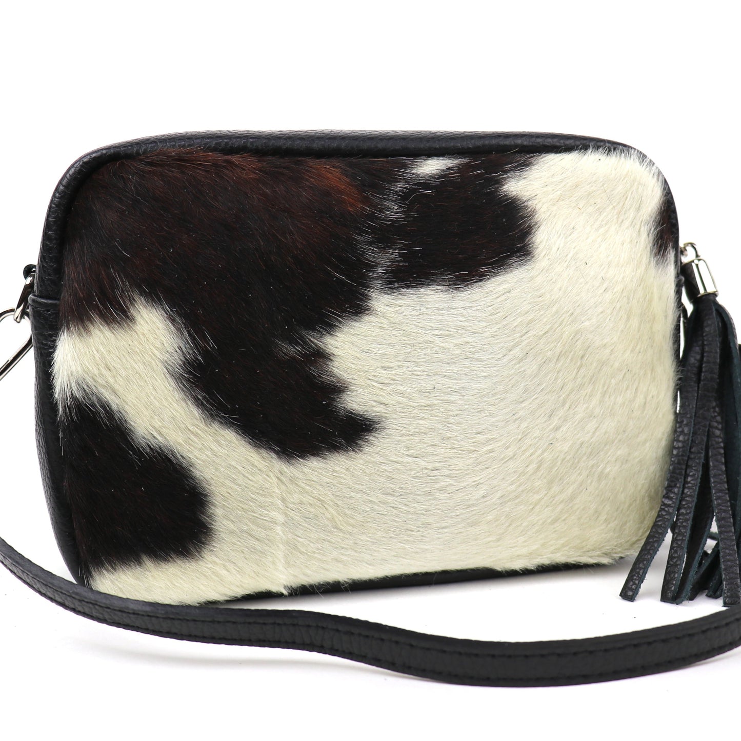 Pony print leather bag with detachable black strap and tassel, displayed front-facing.