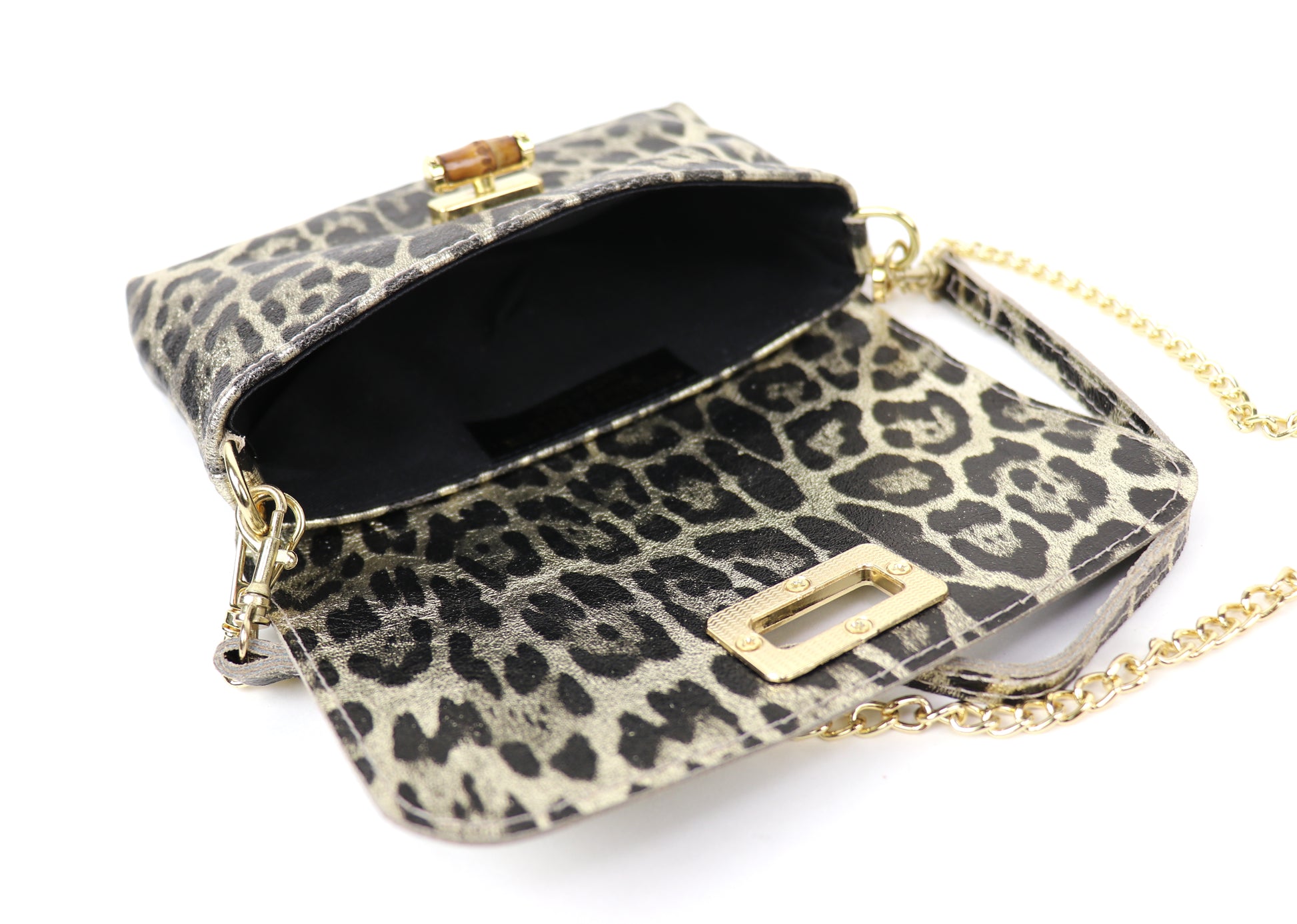 Open gold leopard print bag, displaying the interior space.