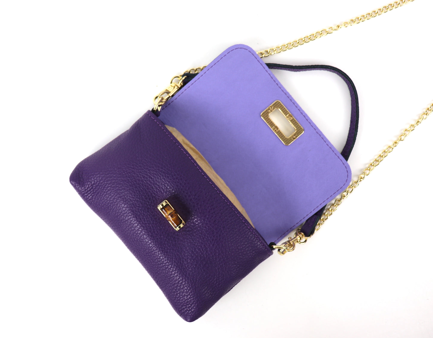 Open purple leather bag, showing the interior