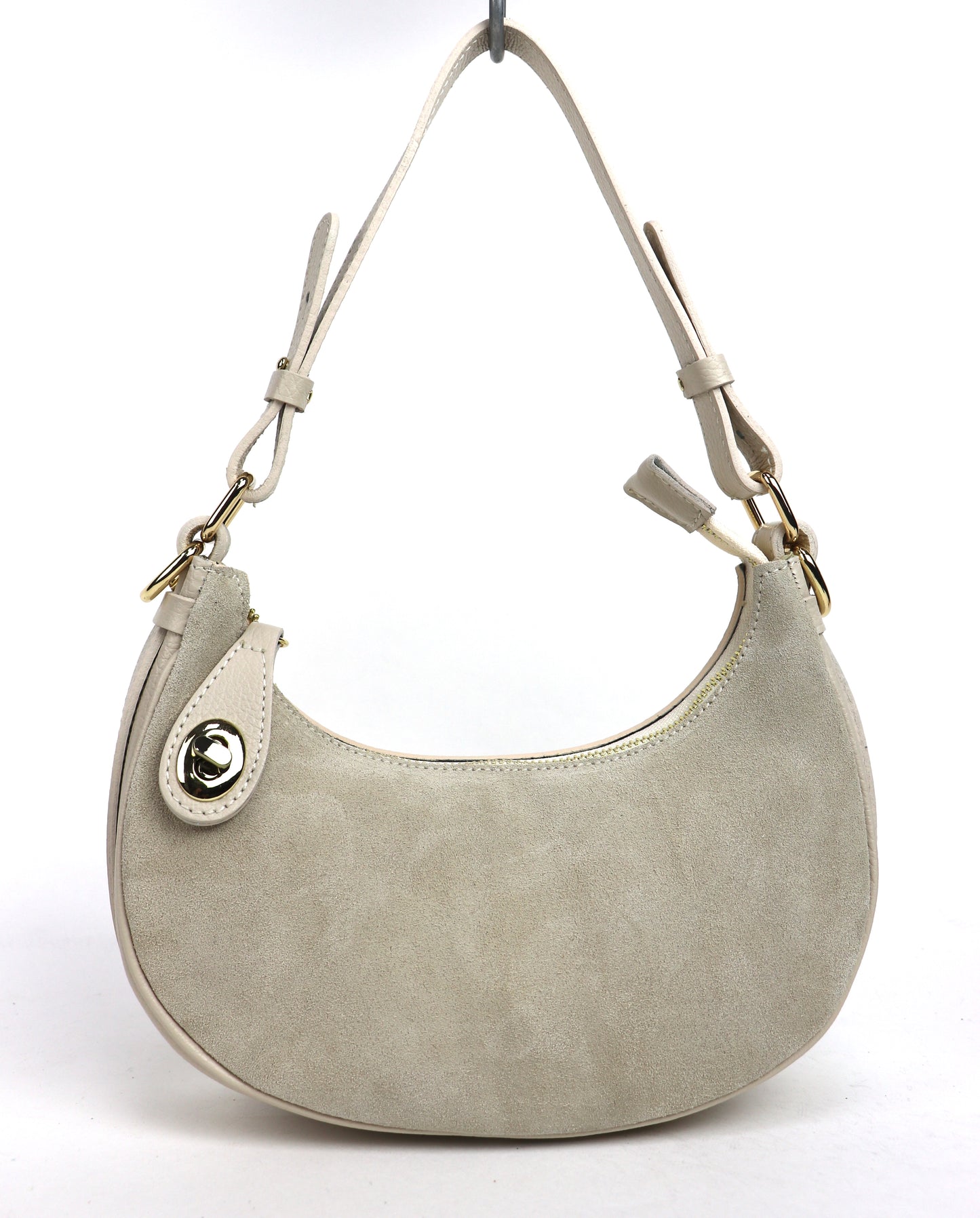 Cream half moon bag front view.
