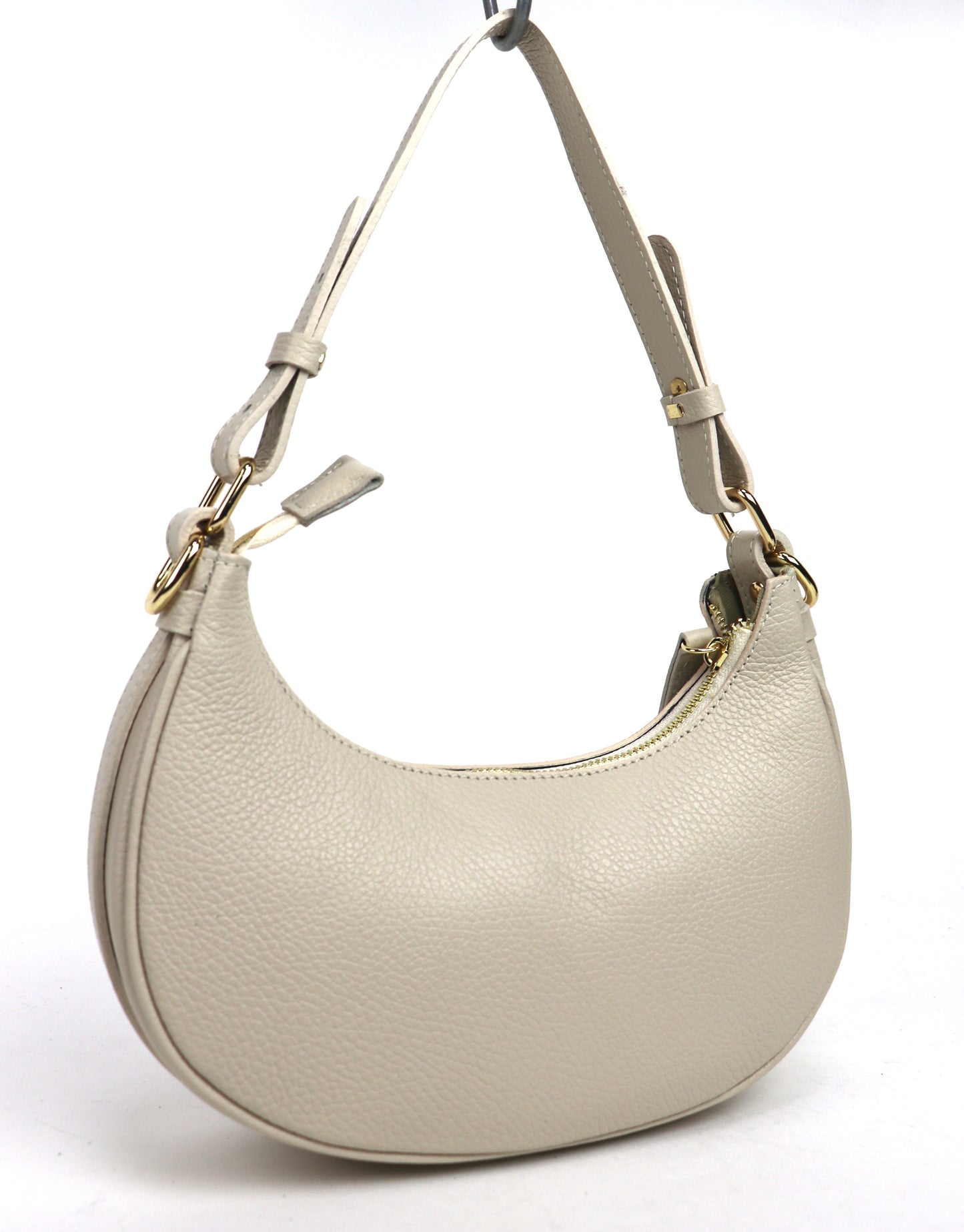 Cream half moon bag back view.
