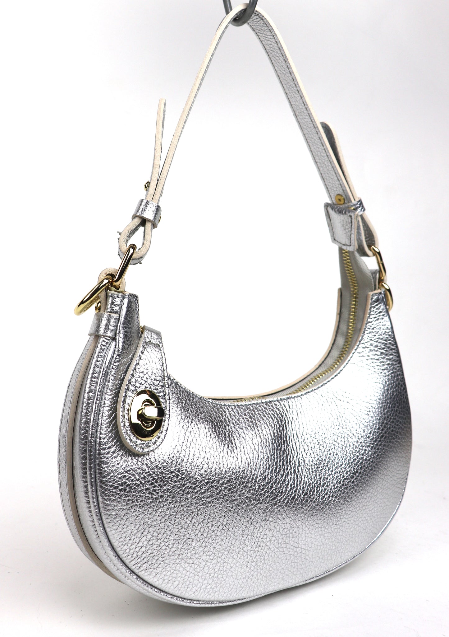 Silver half moon shoulder/crossbody bag, angle view