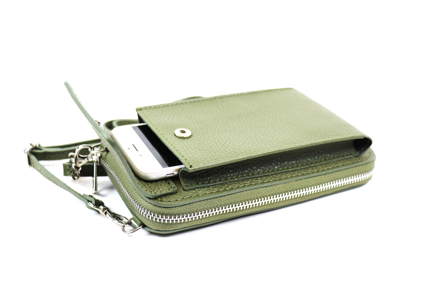 Olive green crossbody bag with an open phone compartment, showing the phone partially inside.