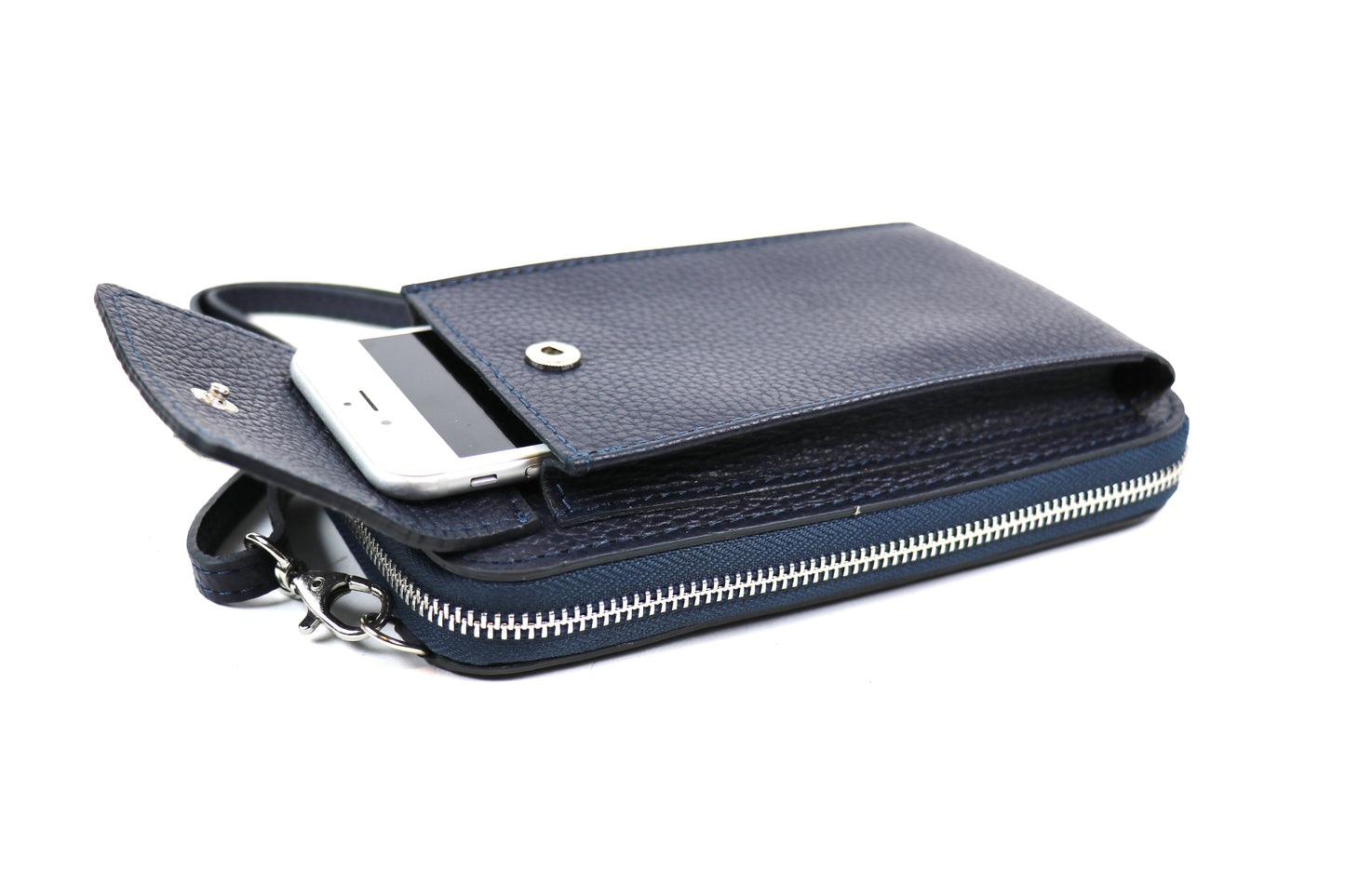 Navy blue Vera Leather Crossbody Bag showing a phone partially placed in the exterior compartment.