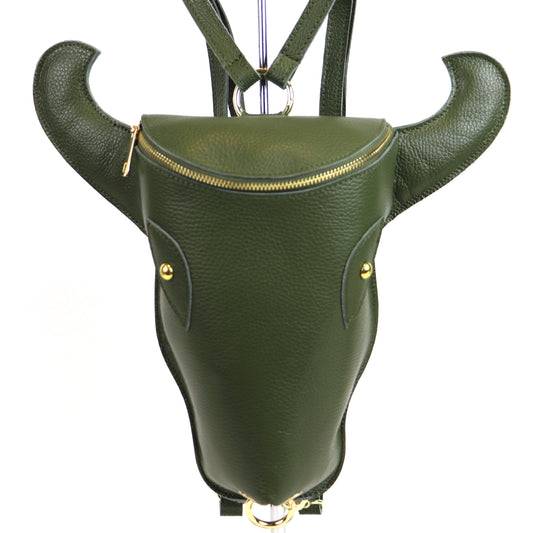 A front view of the olive green cow head leather backpack, emphasizing its sturdy leather and eye-catching horn design.