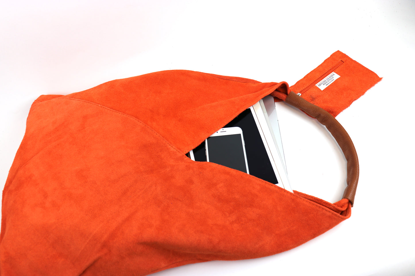 Close-up side view of the Orange Samantha Tote.