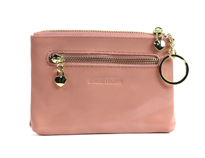 Dusty pink leather pouch with a silver zipper and key ring, angled view.