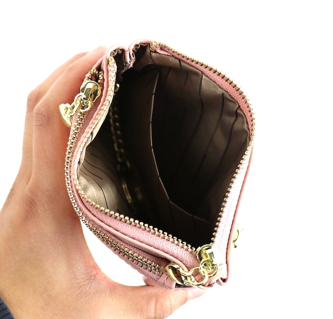 Dusty pink leather pouch with an open view showing the interior.