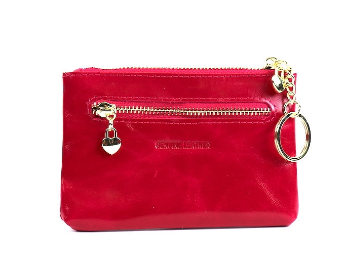 Fuchsia leather pouch with a silver zipper and key ring.