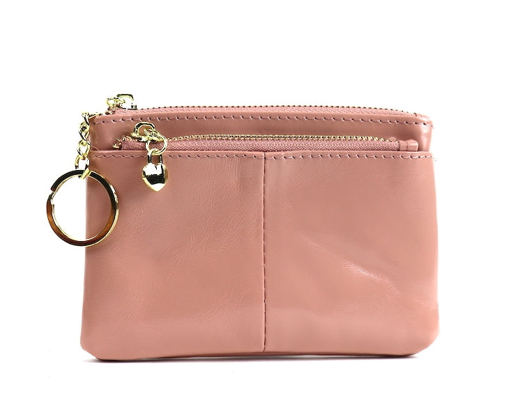 Dusty pink leather pouch with a silver zipper and key ring.