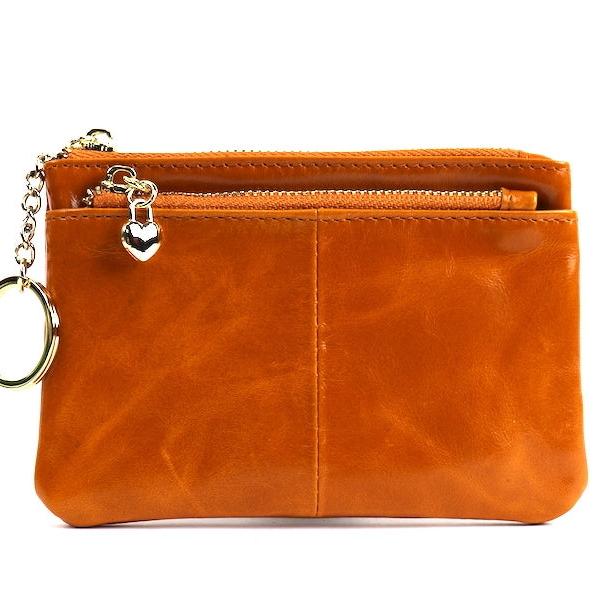 Light tan leather pouch with a silver zipper and key ring.