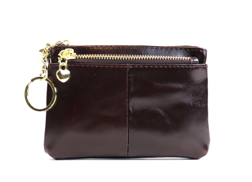 Black leather pouch with a silver zipper and key ring.
